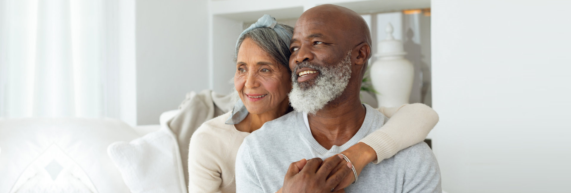 senior couple are smiling